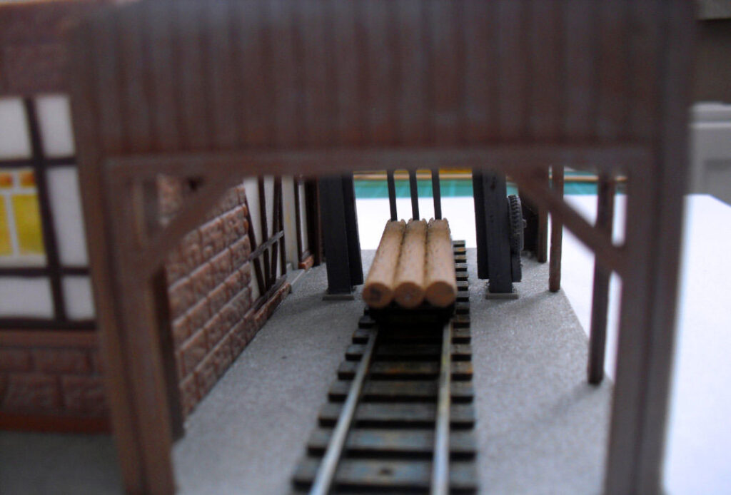 Lore mit Holzstämme